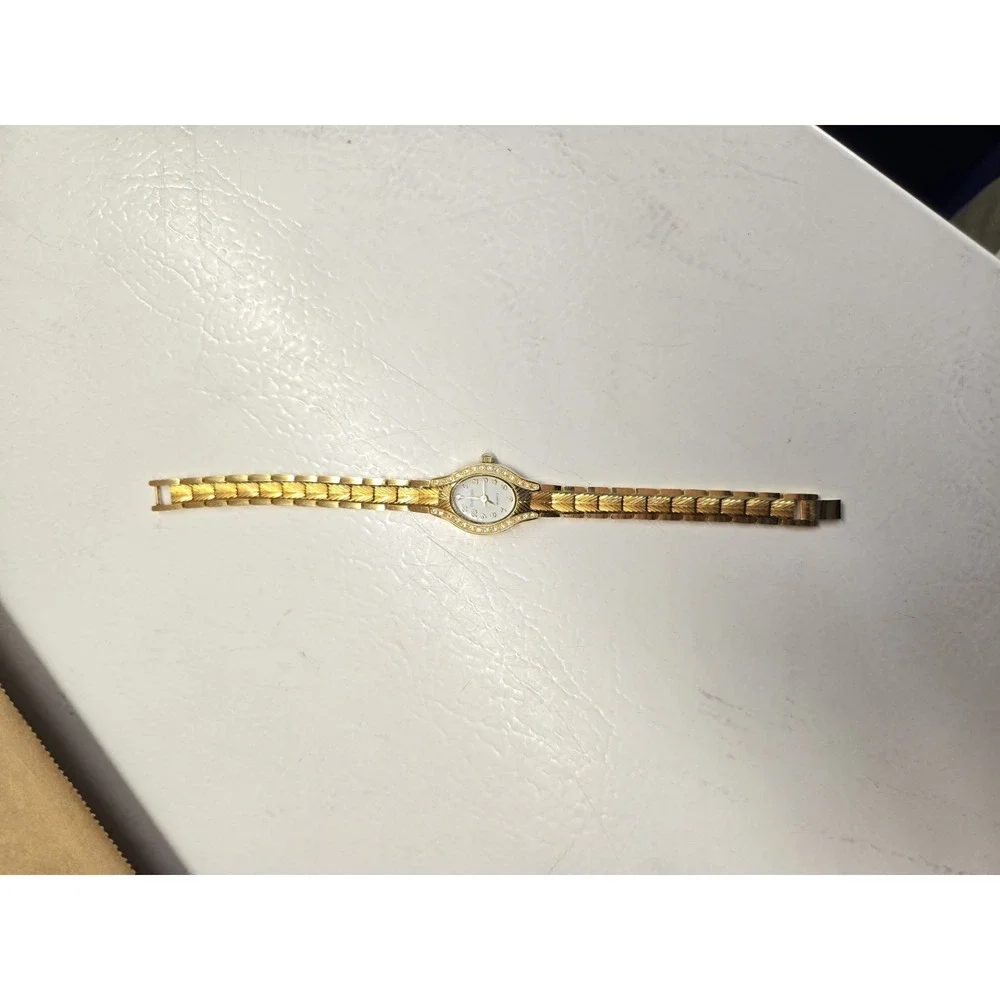 Embassy Womens Watch Gold Tone Rhinestone Bezel Small Chevron Link Bracelet